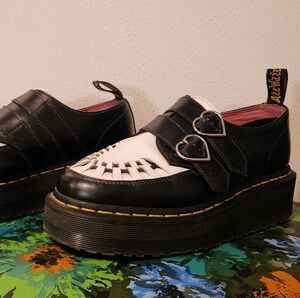Dr. Martens Black and White Platform Buckle Loafers